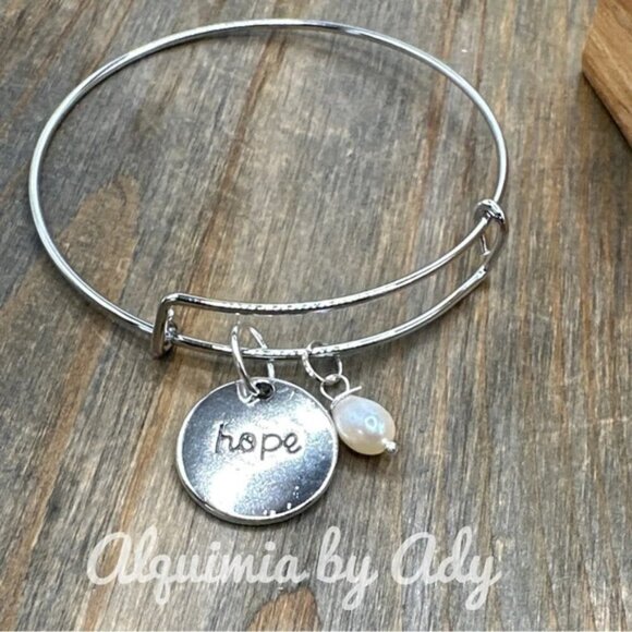 Statement  Silver charm adorned bracelet - Picture 1 of 2